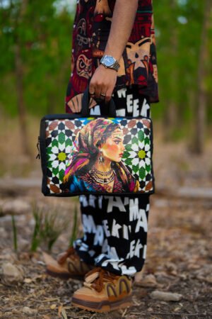 Moroccan leather laptop bag featuring a woman with traditional zellige mosaic background