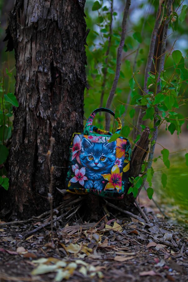 Heritage Handbag featuring a charming cat design. Stylish, durable, and full of cultural charm with a playful twist.